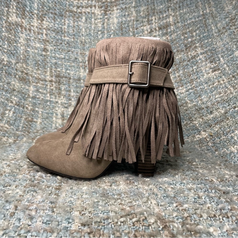 Qupid Women Almond Toe Belted Fringe Ankle Bootie in Taupe